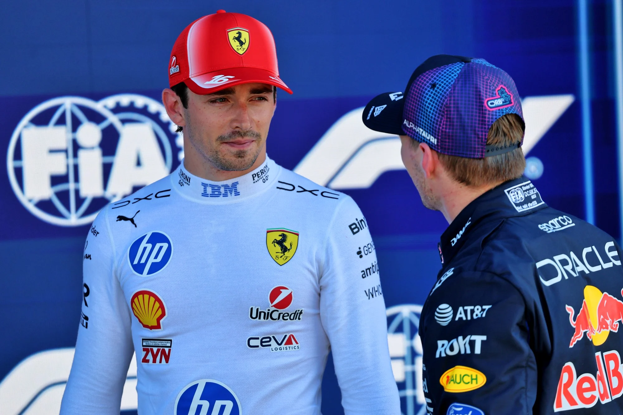 (L to R): Charles Leclerc (MON) Scuderia Ferrari and Max Verstappen (NLD) Red Bull Racing in qualifying parc ferme.